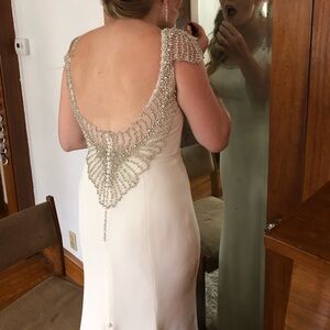 Mermaid silhouette  crepe wedding gown